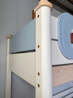 Model 6332 solid wood post and blue panel detail